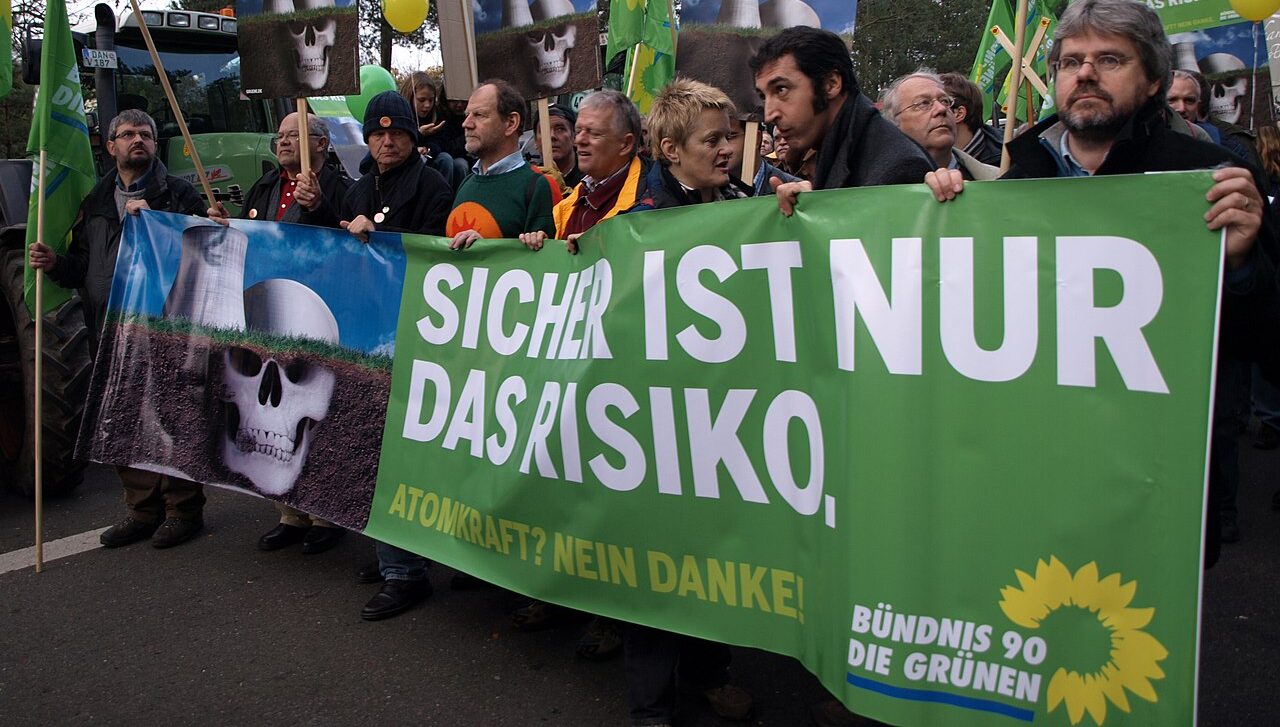 Bündnis 90/Die Grünen protest against nuclear energy near nuclear waste disposal centre Gorleben in northern Germany where a trainload of treated waste arrived from France. The signs say, "Only the risk is certain. Atomic power? No, thanks.!"